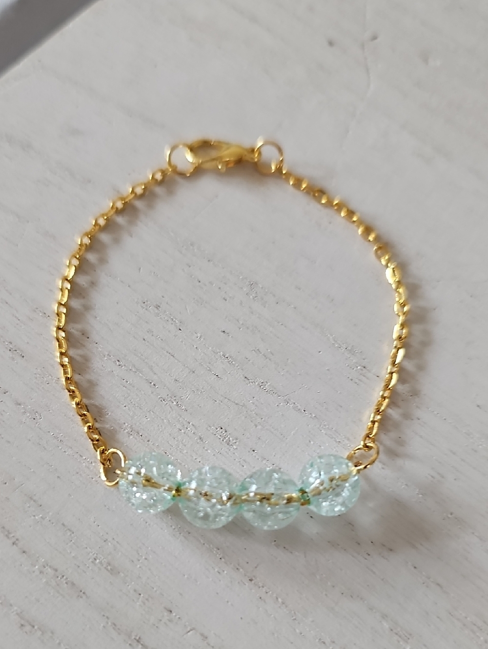 Delicate Gold Tone Bracelet with Pale Aqua Beads